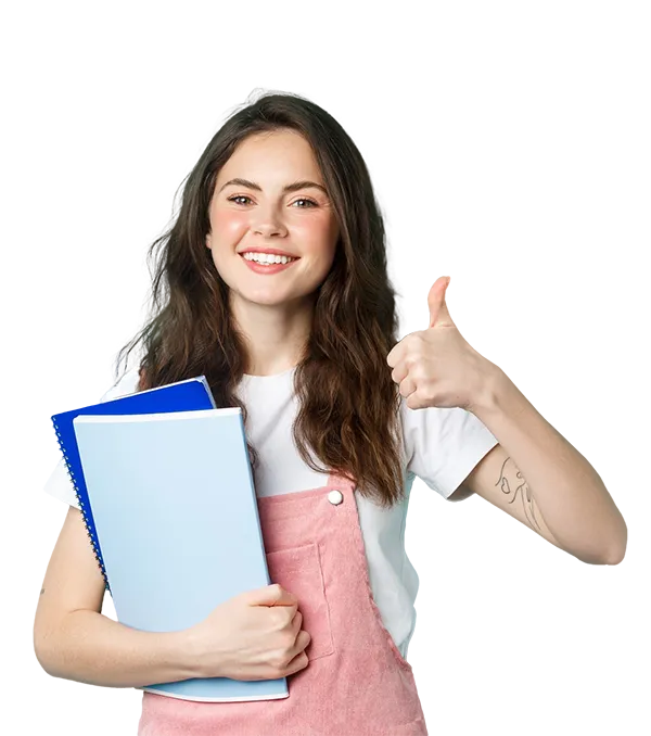 A smiling student holding books